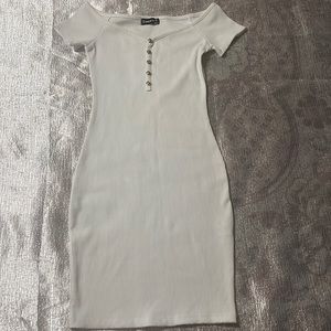 This is Popular 21 in size small with gold buttons and white dress.